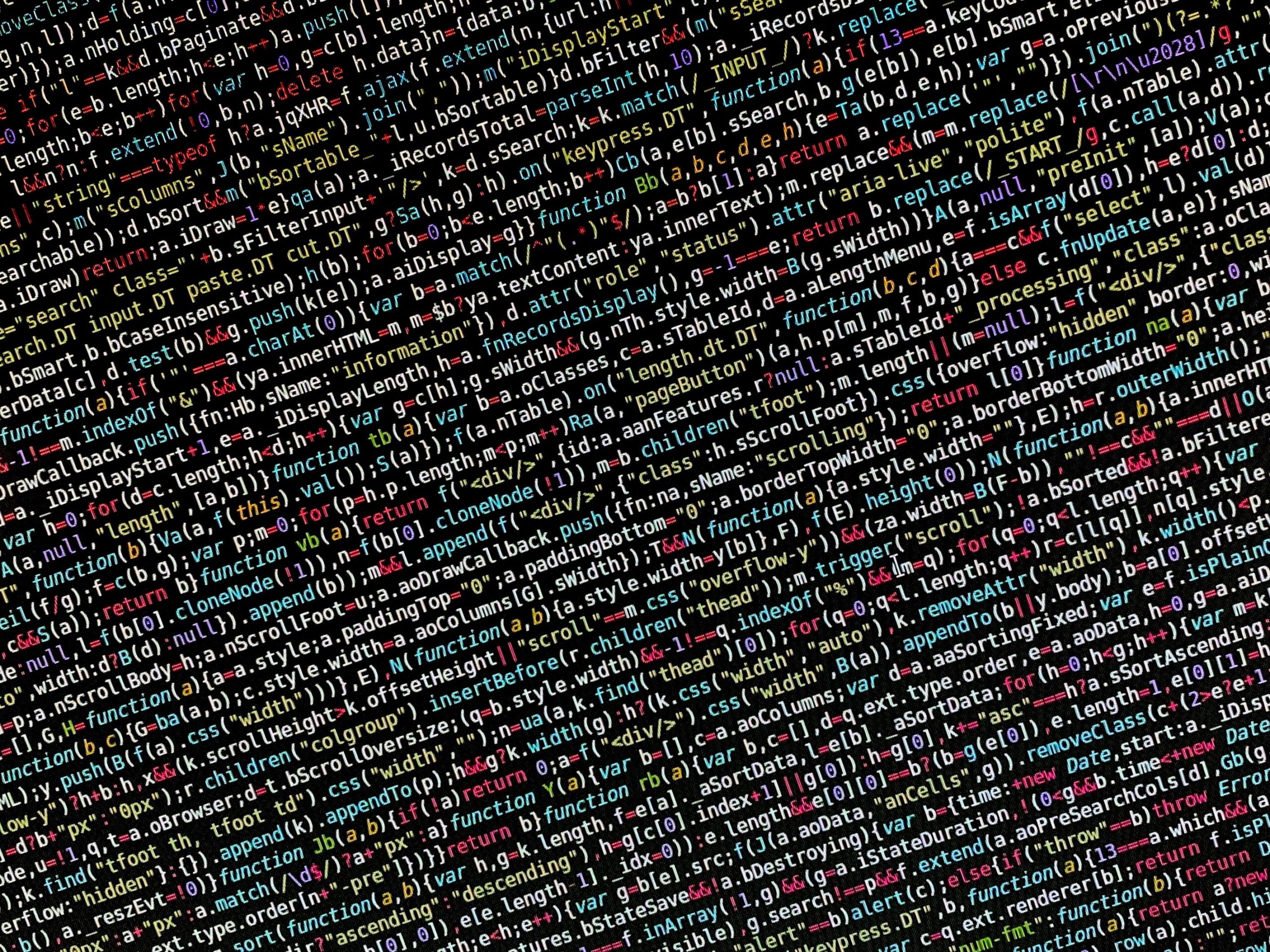 Close-up of programming code on a screen, illustrating the development process in languages like Scala, Python, and Java for Spark 4.2.