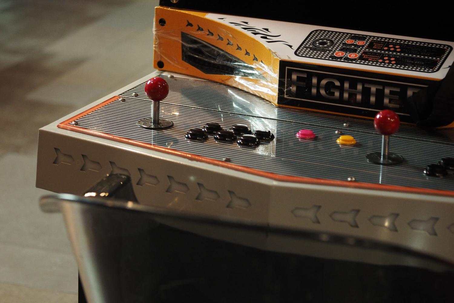 Vintage arcade game control panel, emphasizing the preservation of classic arcade hardware.